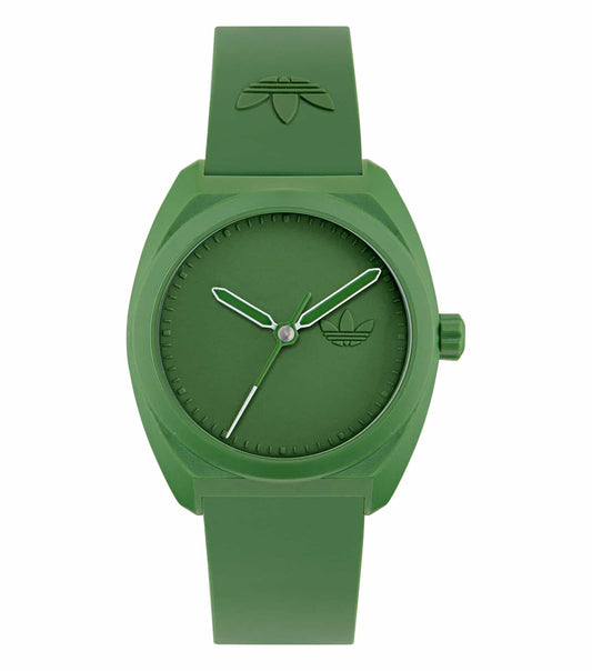 Adidas green watch featuring a sleek strap, elegant round dial, and a side angle view highlighting precision and modernity.