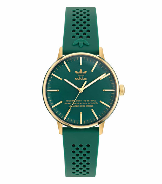 Adidas quartz watch with a beige strap showcased at a side angle, emphasizing its sleek black and gold minimalist design.