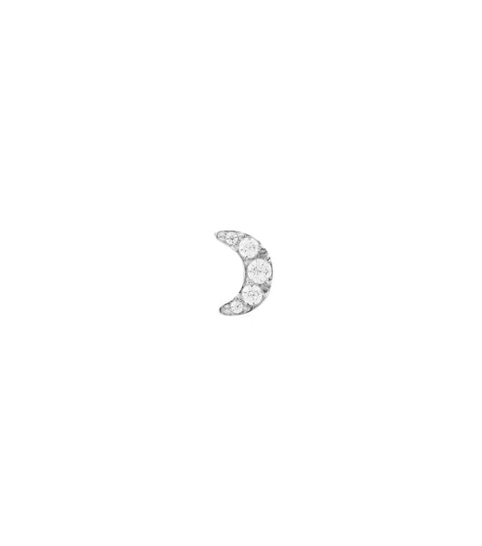 Daniel Wellington single crystal gold earring showcased on a white surface, highlighting its elegant yellow hue with a slightly angled perspective.