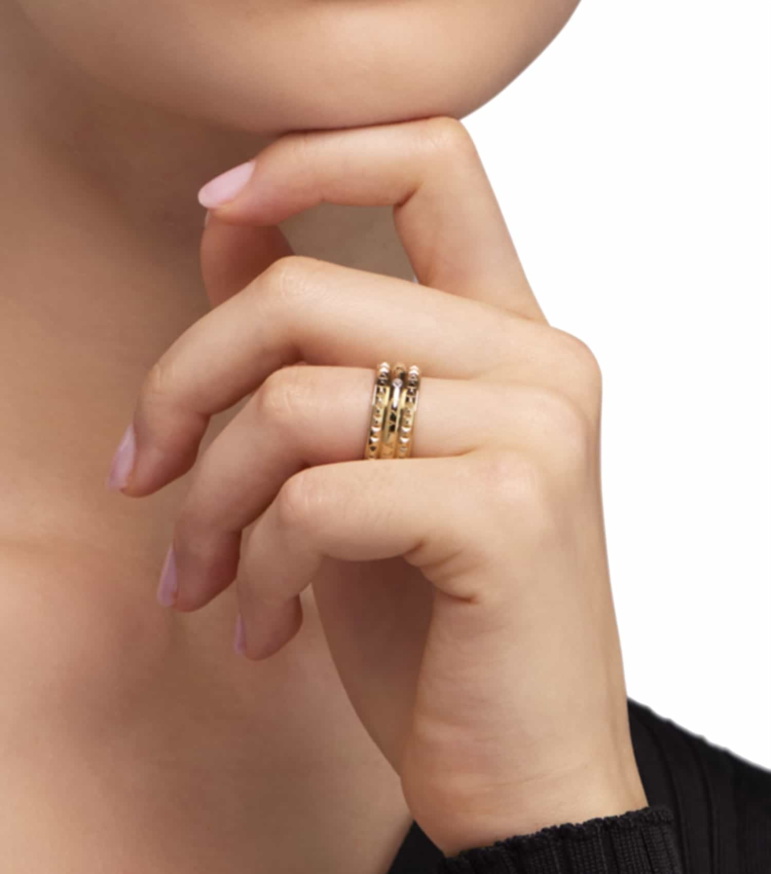 Furla gold ring, elegant design with textured cylindrical elements, top view displaying intricate craftsmanship and luxurious allure.