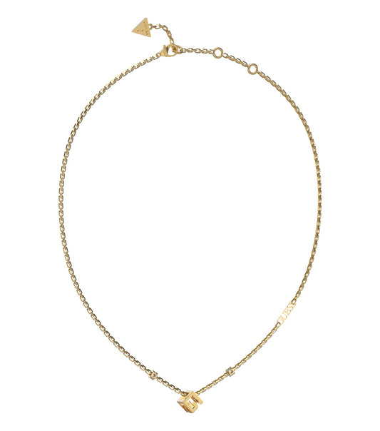 Gold Guess Jewellery necklace with intricate chain design, elegantly showcased at a dynamic angle against a soft focus background.