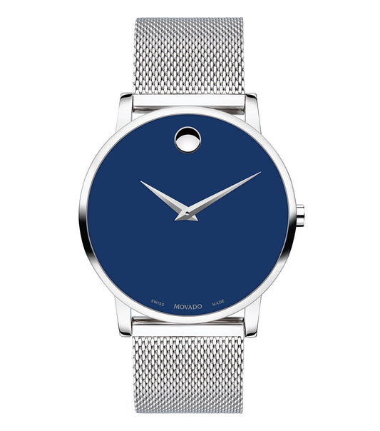 Classic Movado watch with a sleek silver finish, elegantly angled to highlight its minimalist design, embodying timeless sophistication.