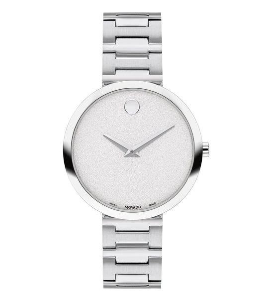 Movado Women's Museum Classic watch in striking gold color, displayed at a three-quarter top angle, showcasing its elegant dial and minimalist design.