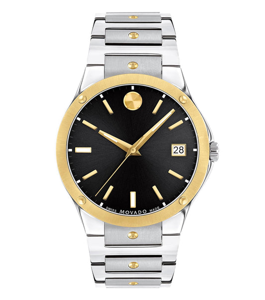 Movado watch in elegant silver, front angle, showcasing the sleek round face and minimalist design on a polished surface.